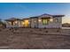 Attractive ranch house exterior with stone detailing at 22859 W Euclid Ave, Buckeye, AZ 85326