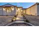 Spanish-style home with a walkway leading to the entryway at 22859 W Euclid Ave, Buckeye, AZ 85326