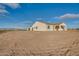 Front exterior view of house with two-car garage at 22859 W Euclid Ave, Buckeye, AZ 85326