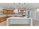 Modern kitchen with large island and white quartz countertops at 22859 W Euclid Ave, Buckeye, AZ 85326