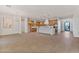 Open concept kitchen with island and hardwood floors at 22859 W Euclid Ave, Buckeye, AZ 85326