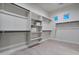 Large walk-in closet, offering shelves and hanging rods for storage at 22859 W Euclid Ave, Buckeye, AZ 85326