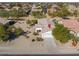 Aerial view of a single-story house with a large backyard and desert landscaping at 2490 E Fiesta Dr, Casa Grande, AZ 85194