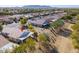 Aerial view of house and neighborhood, showcasing surrounding homes at 2490 E Fiesta Dr, Casa Grande, AZ 85194