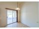 Bright dining area with sliding door access to the backyard at 2490 E Fiesta Dr, Casa Grande, AZ 85194