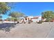 House exterior view showcasing landscaping and neighborhood context at 2490 E Fiesta Dr, Casa Grande, AZ 85194