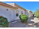 Backyard view of single story house with white exterior and desert landscaping at 2490 E Fiesta Dr, Casa Grande, AZ 85194