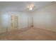 Bright main bedroom with carpeted floors and ceiling fan at 2490 E Fiesta Dr, Casa Grande, AZ 85194