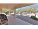 Covered patio with flagstone and seating area at 2490 E Fiesta Dr, Casa Grande, AZ 85194