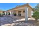 Covered patio with flagstone flooring and a built-in grill at 2490 E Fiesta Dr, Casa Grande, AZ 85194