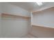 Bright walk-in closet with double hanging rods and shelves at 2490 E Fiesta Dr, Casa Grande, AZ 85194