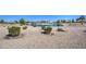 Scenic view of a golf course with a pond at 26409 S Moonshadow Dr, Sun Lakes, AZ 85248