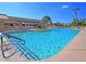 Resort-style pool with lounge chairs at 26409 S Moonshadow Dr, Sun Lakes, AZ 85248