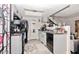 Modern kitchen with gray cabinets and black appliances at 2697 W Ocotillo Rd, Phoenix, AZ 85017