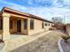 Spacious backyard patio with covered seating area, perfect for outdoor living at 2706 N 115Th Dr, Avondale, AZ 85392