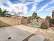 Inviting backyard oasis featuring a sparkling pool, ideal for relaxation and entertainment at 2706 N 115Th Dr, Avondale, AZ 85392