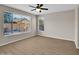 Bedroom with backyard view and ceiling fan at 2706 N 115Th Dr, Avondale, AZ 85392