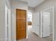 Hallway with access to kitchen and bedrooms at 2706 N 115Th Dr, Avondale, AZ 85392