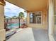 Covered patio overlooking the pool and backyard at 2706 N 115Th Dr, Avondale, AZ 85392