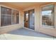 Covered patio with sliding glass doors and windows at 2706 N 115Th Dr, Avondale, AZ 85392