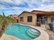 Inviting kidney shaped pool with concrete decking and steps at 2706 N 115Th Dr, Avondale, AZ 85392