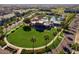 Aerial view of community pool and green space at 2707 N Acacia Way, Buckeye, AZ 85396