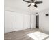 Bedroom with ample closet space and access to another room at 2728 E Encanto Cir, Mesa, AZ 85213