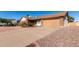 Brick house with a two-car garage and a long driveway at 2728 E Encanto Cir, Mesa, AZ 85213