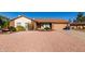 Single-story home with a two-car garage and well-maintained landscaping at 2728 E Encanto Cir, Mesa, AZ 85213