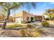 Beautiful desert landscape home with landscaped front yard and two car garage at 27506 N Montana Dr, Rio Verde, AZ 85263