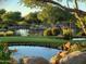 Relaxing water features and pond in a serene landscape at 27506 N Montana Dr, Rio Verde, AZ 85263