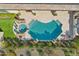 Aerial view of a home with a large pool and spa at 29512 N Tarragona Dr, Peoria, AZ 85383