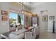 Elegant dining room with large windows and modern lighting at 29512 N Tarragona Dr, Peoria, AZ 85383