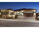 Single-story home with a two-car garage and well-maintained landscaping at 29512 N Tarragona Dr, Peoria, AZ 85383