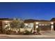 Attractive single-story home with desert landscaping and a three-car garage at 29512 N Tarragona Dr, Peoria, AZ 85383