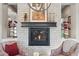 Elegant fireplace with a modern design and decorative accents at 29512 N Tarragona Dr, Peoria, AZ 85383