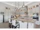 Spacious kitchen island with granite countertops and seating at 29512 N Tarragona Dr, Peoria, AZ 85383