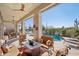 Relaxing patio with seating area and views of the pool at 29512 N Tarragona Dr, Peoria, AZ 85383