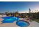 Luxury pool and spa with outdoor seating and a built-in grill at 29512 N Tarragona Dr, Peoria, AZ 85383