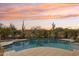 Relaxing pool and spa area with a beautiful sunset view at 29512 N Tarragona Dr, Peoria, AZ 85383