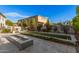 Outdoor entertaining area with bocce ball court, fire pit, and extensive patio at 3040 N Point Ridge Rd, Buckeye, AZ 85396