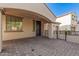 Front entry with brick pavers and covered walkway at 3040 N Point Ridge Rd, Buckeye, AZ 85396