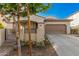 Two-story house with a courtyard and gated entrance at 3040 N Point Ridge Rd, Buckeye, AZ 85396