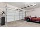 Attached garage with ample space and an automatic door opener at 3040 N Point Ridge Rd, Buckeye, AZ 85396