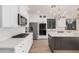 Gourmet kitchen with stainless steel appliances and white cabinetry at 3040 N Point Ridge Rd, Buckeye, AZ 85396