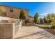 Outdoor kitchen with built-in grill and patterned tile at 3040 N Point Ridge Rd, Buckeye, AZ 85396