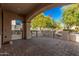 Brick paved patio with metal gate and arched entryway at 3040 N Point Ridge Rd, Buckeye, AZ 85396