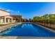 Relaxing pool area with a large rectangular pool and plenty of space for lounging at 3040 N Point Ridge Rd, Buckeye, AZ 85396