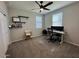 Home office with a desk, chair, and plenty of natural light at 3094 N 195Th Dr, Buckeye, AZ 85396