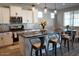 Modern kitchen with stainless steel appliances and island at 3094 N 195Th Dr, Buckeye, AZ 85396